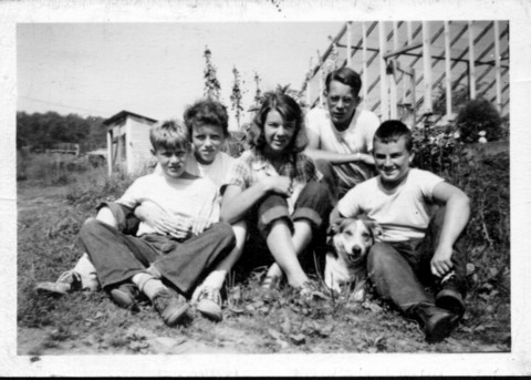 at Ira Morse Farm, in front of greenhouses