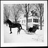 in front of old schoolhouse